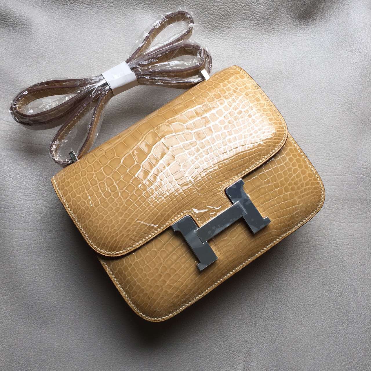 Sale Hermes Apricot Crocodile Shiny Leather Constance Bag19cm