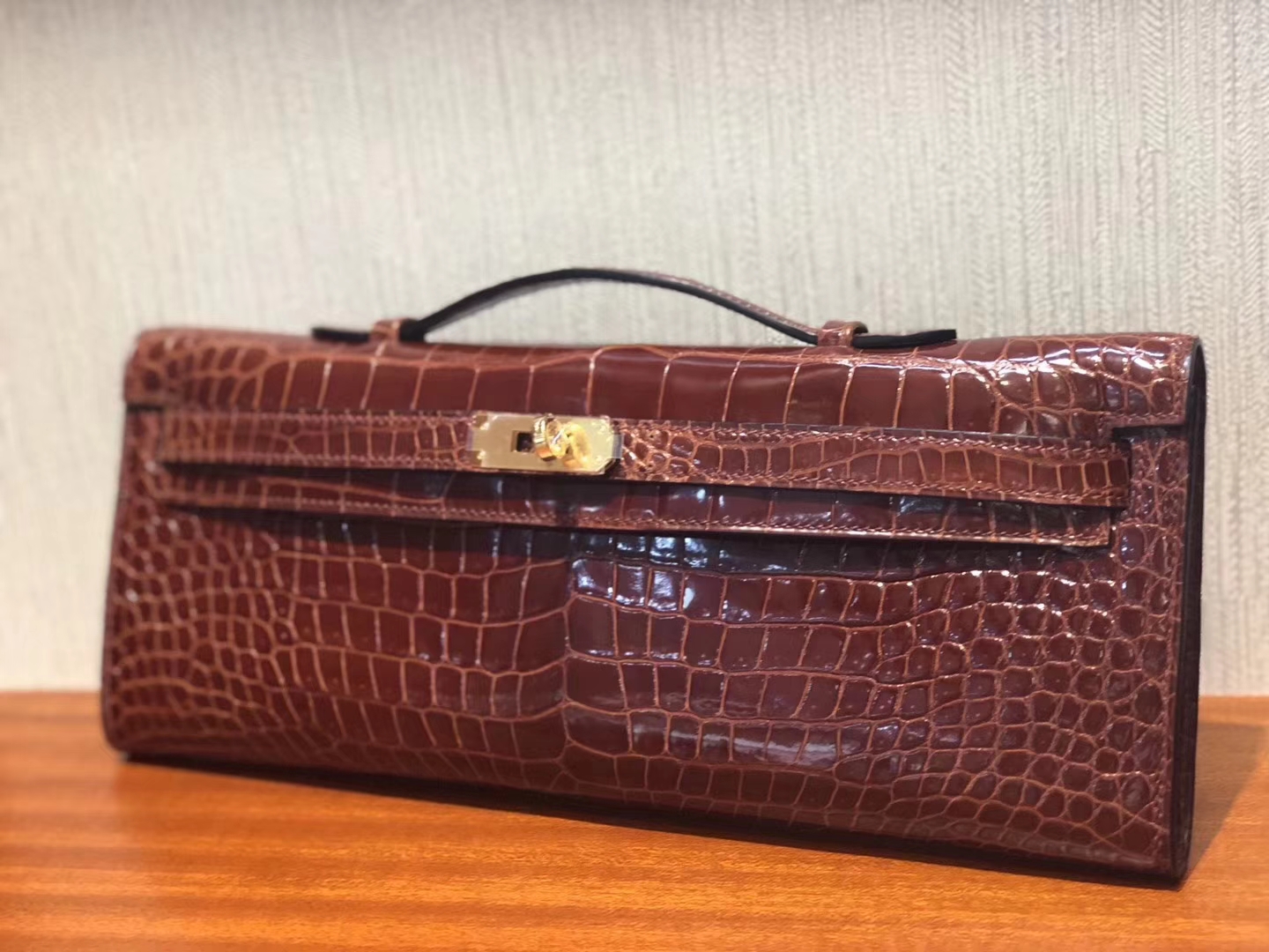 Discount Hermes Porosus Shiny Crocodile Kelly Cut Clutch in CK31 Miel Brown