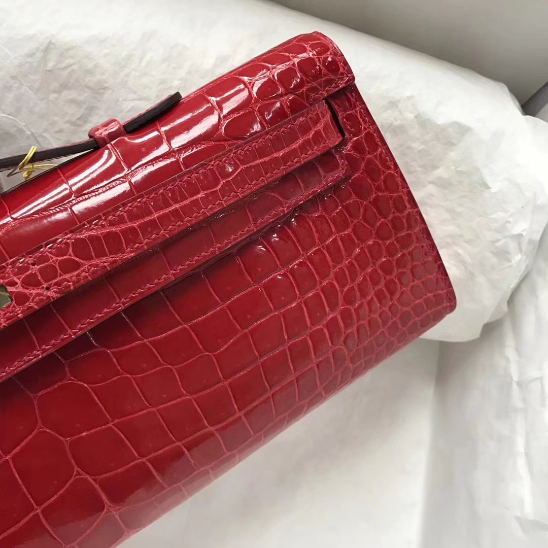 Elegant Hermes Shiny Crocodile Leather Kelly Cut Evening Bag in CK95 Braise Gold Hardware