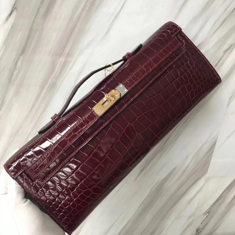 Hermes Shiny Crocodile Leather Kelly Cut Clutch Bag in CK57 Bordeaux Red Gold Hardware